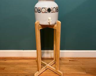 O122 - $45. Blue Wave excess Water Crock with Stand. Crock Holds 2.2 Gallons. Stand Measures 27" Tall.