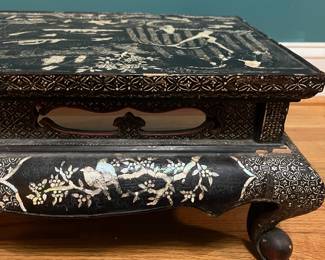 O124 - $850. Antique Kang Table. (Possibly Late Ming-early Qing Dynasty. 17th - 18th Century) Mother of Pearl Inlaid Black Lacquer Low Table. Measures 25" W x 14.5" D x 8.5" Tall.
