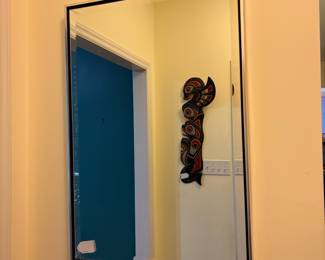 O35 - $30. Chrome Framed Mirror. Measures 25.25” W x 37” Tall.
