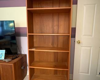 O19 - $40. Bookshelf with Adjustable Shelves. Measures 31.75” W x 12” D x 70.5” Tall.
