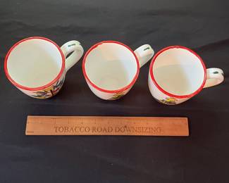 O106 - $25. Set of 3 Vietri Christmas Tree Mugs.