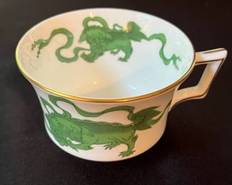 O110 - $400. Set of Wedgwood "Chinese Tigers" Green China. 1 - Coffee Pot, 1 Tea Pot (has a crack), 1 - Saucer, 1 - Trinket Dish, 1 - Cream and Sugar, 3 - Tea Cups, 3 - 8.25" Plates