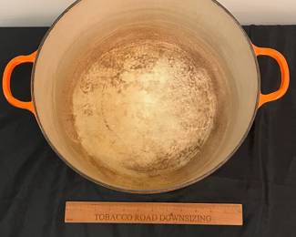 O87 - $80. Le Creuset Flame Orange “K” 13 -14 Qt.