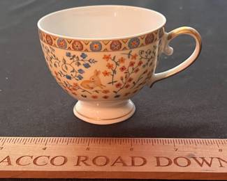 O117 - $80. "Dame A La Licorne" by Philippe Deshoulieres Tea Cup and Saucer.