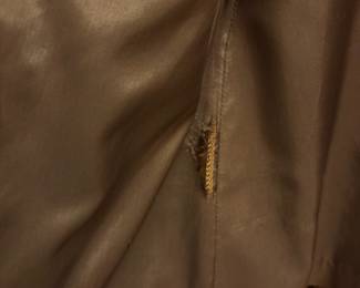 O72 - $100. 1980’s Woman’s Neiman Marcus Sued Fringe Jacket. No size. Measures 18” pit-pit, 26” shoulder-bottom hem.