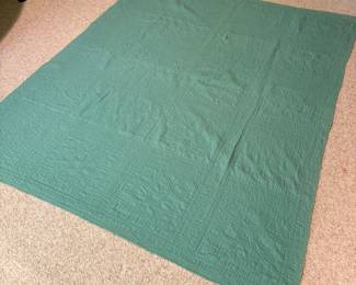 O62 - $65. Vintage Quilt. Measures 65” W x 77” L. Has some worn / thin spots.