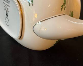 O110 - $400. Set of Wedgwood "Chinese Tigers" Green China. 1 - Coffee Pot, 1 Tea Pot (has a crack), 1 - Saucer, 1 - Trinket Dish, 1 - Cream and Sugar, 3 - Tea Cups, 3 - 8.25" Plates