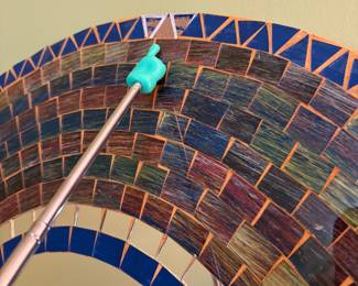 O30 - $5. Tile Mirror. Damaged. Measures 23.5” Diameter.