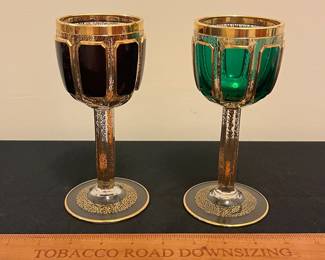 O6 - $1250. Antique Bohemian or Moser-style cut-to-clear glass decanter and cordial set with ornate gold gilding. 2 Tall Wine Glasses. 5 Champagne Coupe. Decanter & Stopper. One glass has a *tiny* chip in the base. All other pieces are in excellent condition!