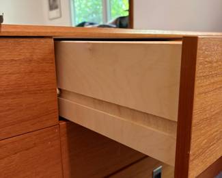 O41 - $275. 9 Drawer Long Dresser. Teak Veneer - Made in Canada. Measures 72” W x 18” D x 27” Tall. Mirror Measures 29.25“ W x 41.25” Tall. All drawers slide - top is in very good condition.