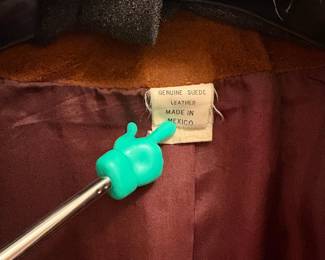 O72 - $100. 1980’s Woman’s Neiman Marcus Sued Fringe Jacket. No size. Measures 18” pit-pit, 26” shoulder-bottom hem.