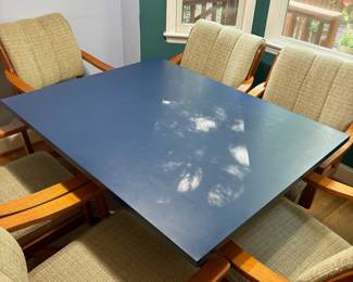 O4 - $125. Table Measures 40” W x 50” L x 28.75” Tall. Blue Laminate top with Chrome Base.