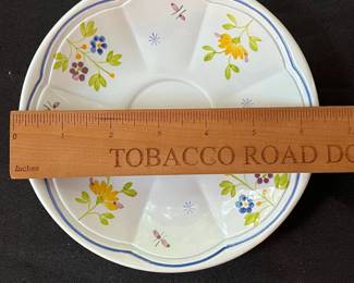 O109 - $275. Set of Longchamp "Printemps" Pottery. 9 - 10" Dinner Plates, 9 - 7.5" Salad Plates, 11 - 6.75" Desert Plates, 11 - 6.25" Saucers, 7 - Tea Cups, 1 Gravy Boat, 1 Sugar Dish.