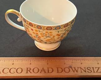 O117 - $80. "Dame A La Licorne" by Philippe Deshoulieres Tea Cup and Saucer.