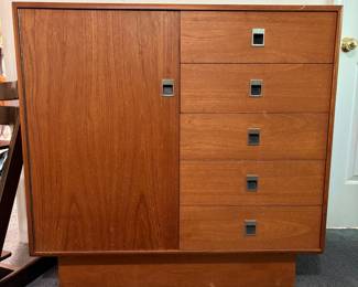 O42 - $225. Teak Veneer Chest of Drawers. Good overall condition. Measures 40” W x 18” D x 39” Tall.