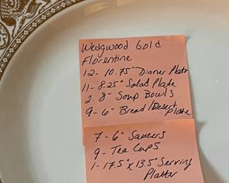 O129 - $400. Set of Wedgwood Gold "Florentine" China. 12 - 10.75" Plates, 11 - 8.25" Salad Plates, 2 - 8" Soup Bowls, 9 - 6" Bread Desert Plates, 7 - 6" Saucers, 9 - Tea Cups, 1 - 17.5" x 13.5" Oval Serving Platter.