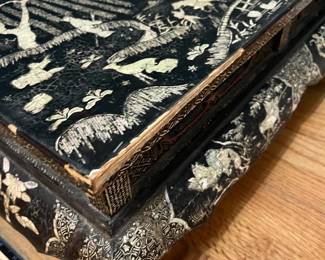 O124 - $850. Antique Kang Table. (Possibly Late Ming-early Qing Dynasty. 17th - 18th Century) Mother of Pearl Inlaid Black Lacquer Low Table. Measures 25" W x 14.5" D x 8.5" Tall.