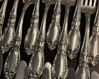 S1 - $7,500. Towle Sterling Flatware Set. 15 of each Dinner Knives, Dinner Forks, Salad Forks, Dessert Spoons. 8 of each Butter Knife, Dinner Spoon. Plus Serving Pieces. Text for Weight.