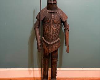 O71 - $95. Metal Knight Sculpture. Measures 16" W x 39.5" Tall.