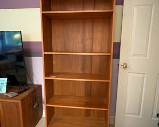 O19 - $40. Bookshelf with Adjustable Shelves. Measures 31.75” W x 12” D x 70.5” Tall.