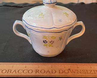 O109 - $275. Set of Longchamp "Printemps" Pottery. 9 - 10" Dinner Plates, 9 - 7.5" Salad Plates, 11 - 6.75" Desert Plates, 11 - 6.25" Saucers, 7 - Tea Cups, 1 Gravy Boat, 1 Sugar Dish.