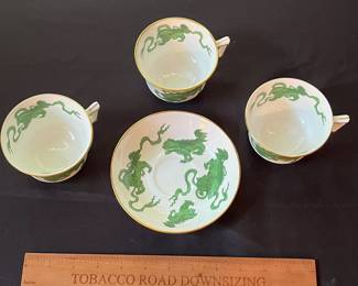 O110 - $400. Set of Wedgwood "Chinese Tigers" Green China. 1 - Coffee Pot, 1 Tea Pot (has a crack), 1 - Saucer, 1 - Trinket Dish, 1 - Cream and Sugar, 3 - Tea Cups, 3 - 8.25" Plates