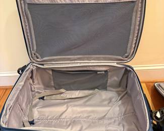 O77 - $80. Travel Pro Maxlite Luggage Set. Soft Side, Expandable, Spinner Wheels. One 25” and one 20”.