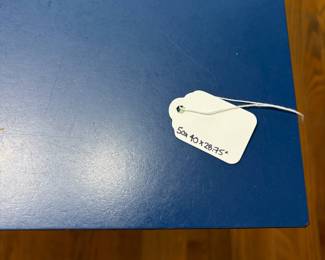 O4 - $125. Table Measures 40” W x 50” L x 28.75” Tall. Blue Laminate top with Chrome Base.