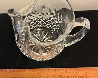 O95 - $30. Waterford Crystal “Lismore” Pitcher with Ice Lip. Measures 6” Tall.