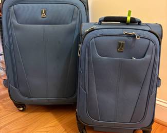 O77 - $80. Travel Pro Maxlite Luggage Set. Soft Side, Expandable, Spinner Wheels. One 25” and one 20”.