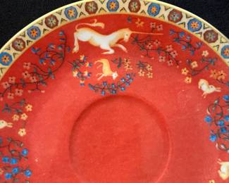 O117 - $80. "Dame A La Licorne" by Philippe Deshoulieres Tea Cup and Saucer.