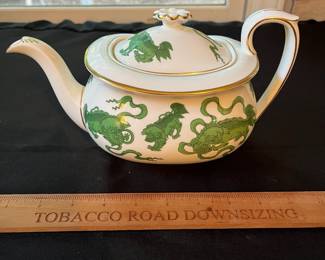 O110 - $400. Set of Wedgwood "Chinese Tigers" Green China. 1 - Coffee Pot, 1 Tea Pot (has a crack), 1 - Saucer, 1 - Trinket Dish, 1 - Cream and Sugar, 3 - Tea Cups, 3 - 8.25" Plates