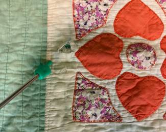 O62 - $65. Vintage Quilt. Measures 65” W x 77” L. Has some worn / thin spots.