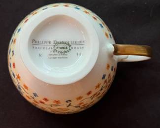 O117 - $80. "Dame A La Licorne" by Philippe Deshoulieres Tea Cup and Saucer.