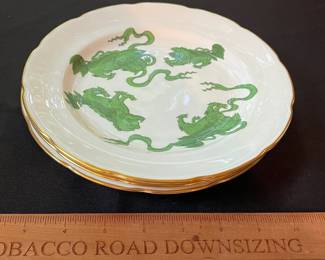 O110 - $400. Set of Wedgwood "Chinese Tigers" Green China. 1 - Coffee Pot, 1 Tea Pot (has a crack), 1 - Saucer, 1 - Trinket Dish, 1 - Cream and Sugar, 3 - Tea Cups, 3 - 8.25" Plates