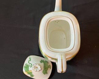 O110 - $400. Set of Wedgwood "Chinese Tigers" Green China. 1 - Coffee Pot, 1 Tea Pot (has a crack), 1 - Saucer, 1 - Trinket Dish, 1 - Cream and Sugar, 3 - Tea Cups, 3 - 8.25" Plates