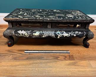 O124 - $850. Antique Kang Table. (Possibly Late Ming-early Qing Dynasty. 17th - 18th Century) Mother of Pearl Inlaid Black Lacquer Low Table. Measures 25" W x 14.5" D x 8.5" Tall.