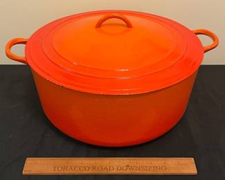 O87 - $80. Le Creuset Flame Orange “K” 13 -14 Qt.