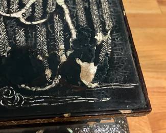 O124 - $850. Antique Kang Table. (Possibly Late Ming-early Qing Dynasty. 17th - 18th Century) Mother of Pearl Inlaid Black Lacquer Low Table. Measures 25" W x 14.5" D x 8.5" Tall.