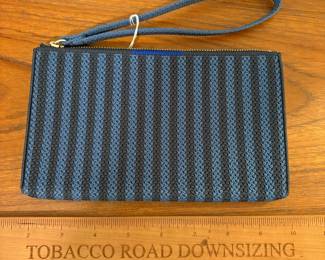 O76 - $25. Rothy’s Wristlet. Like New.