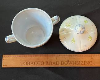 O109 - $275. Set of Longchamp "Printemps" Pottery. 9 - 10" Dinner Plates, 9 - 7.5" Salad Plates, 11 - 6.75" Desert Plates, 11 - 6.25" Saucers, 7 - Tea Cups, 1 Gravy Boat, 1 Sugar Dish.