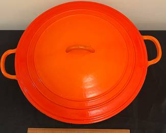 O87 - $80. Le Creuset Flame Orange “K” 13 -14 Qt.
