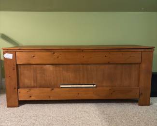O28 - $75. Wooden Storage Chest. Measures 50” W x 19” D x 20.5” Tall.