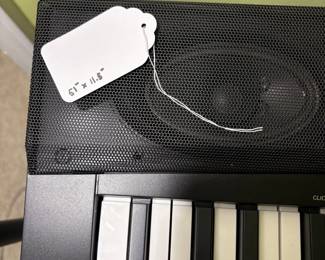 O26 - $40. BCP Digital Piano. Measures 51” W x 14” D x 32” Tall.