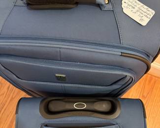 O77 - $80. Travel Pro Maxlite Luggage Set. Soft Side, Expandable, Spinner Wheels. One 25” and one 20”.