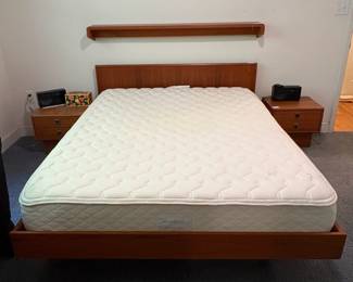 O39 - $250. Queen Platform Bed Frame - Made in Canada. Teak Veneer. Has 2 drawers underneath. This includes Platform Bed Frame, Headboard & Floating Shelf. Measures 64” W x 82.5“ L x 31” Tall.