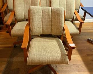 O5 - $240. Set of 6 Upholstered, Rolling Dining Chairs. Each Chair Measures 27" W x 28" D x floor to seat 18" x floor to back 35" Tall.