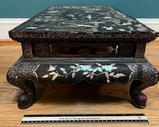 O124 - $850. Antique Kang Table. (Possibly Late Ming-early Qing Dynasty. 17th - 18th Century) Mother of Pearl Inlaid Black Lacquer Low Table. Measures 25" W x 14.5" D x 8.5" Tall.
