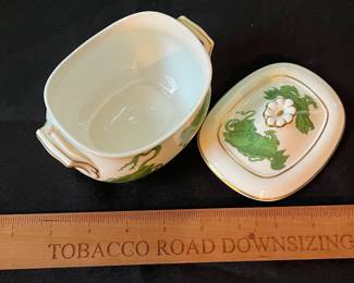 O110 - $400. Set of Wedgwood "Chinese Tigers" Green China. 1 - Coffee Pot, 1 Tea Pot (has a crack), 1 - Saucer, 1 - Trinket Dish, 1 - Cream and Sugar, 3 - Tea Cups, 3 - 8.25" Plates