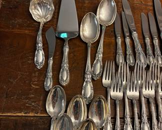S1 - $7,500. Towle Sterling Flatware Set. 15 of each Dinner Knives, Dinner Forks, Salad Forks, Dessert Spoons. 8 of each Butter Knife, Dinner Spoon. Plus Serving Pieces. Text for Weight.